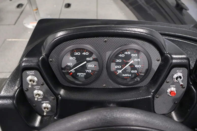 Slide: The Image of Dashboard of 2026 Crestliner 1850 Kodiak SC boat with speedometer and RPM gauges. - 21