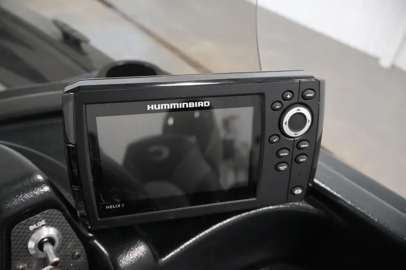 Slide: The Image of Humminbird Helix 5 fish finder on 2026 Crestliner 1850 Kodiak SC boat dashboard. - 22