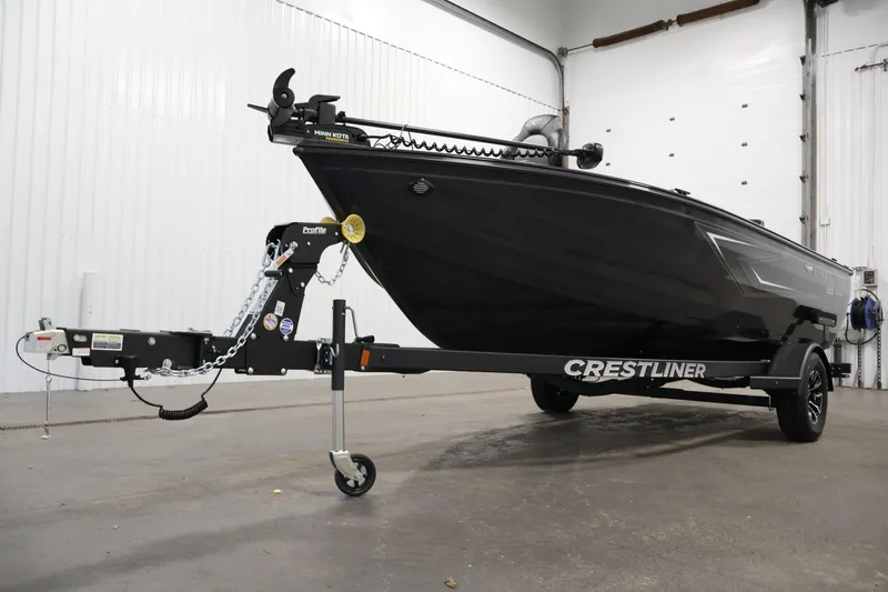 Slide: The Image of 2026 Crestliner 1850 Kodiak SC boat on trailer in indoor setting. - 33