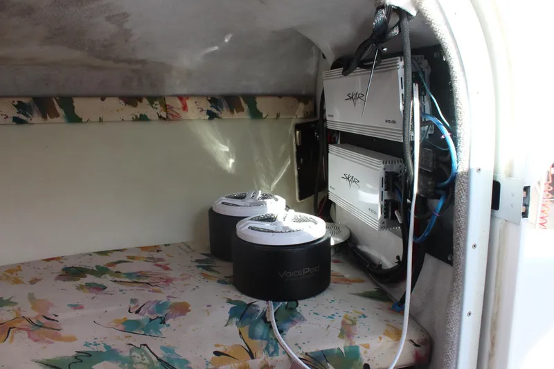 Slide: The Image of Interior of a 1996 Baja 232 boat with Skar audio equipment installed. - 31