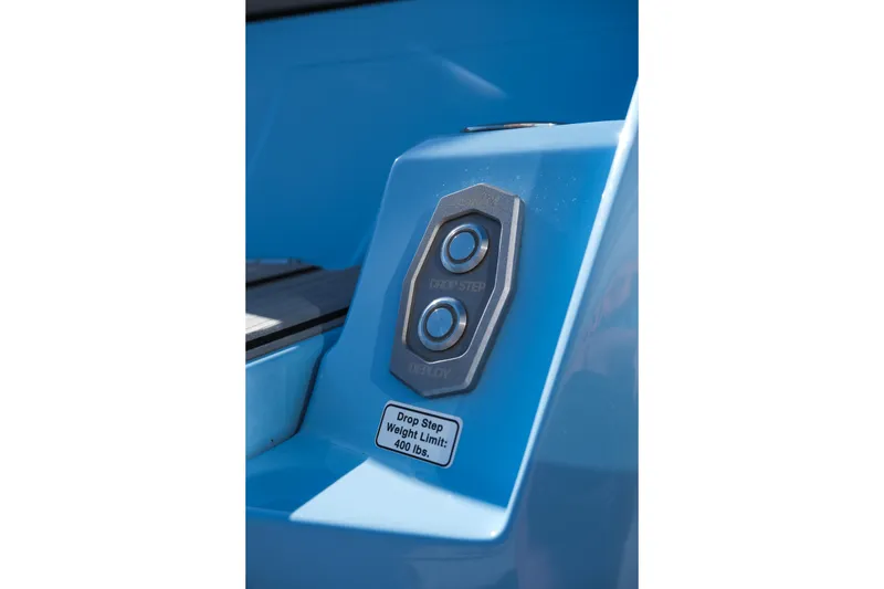 Slide: The Image of 2025 Supra SE550 drop step control panel with weight limit label. - 12