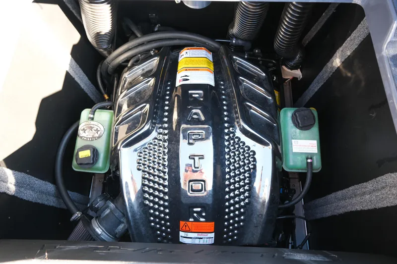 Slide: The Image of 2025 Supra SE550 engine compartment with Raptor branding and components. - 15