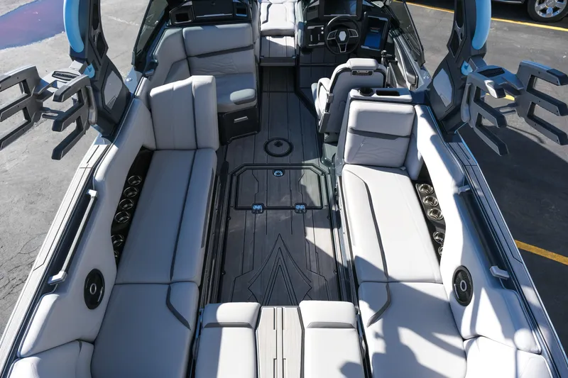 Slide: The Image of 2025 Supra SE550 boat interior with spacious seating and modern design. - 16