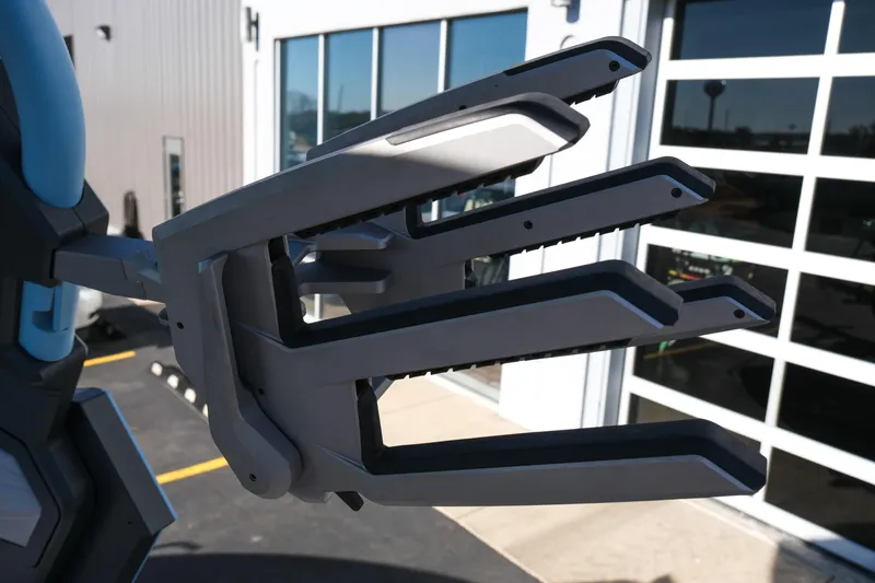 Slide: The Image of Robotic arm detail of 2025 Supra SE550 outside a modern building. - 18