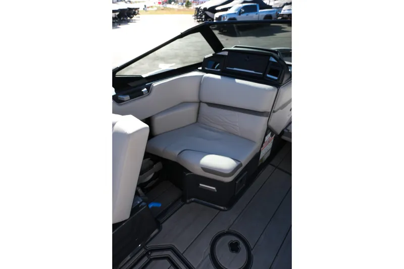 Slide: The Image of 2025 Supra SE550 boat interior with sleek seating and modern design. - 22