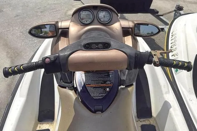 Slide: The Image of 2005 Sea Doo GTI LE-RFI jet ski handlebars and dashboard view. - 8