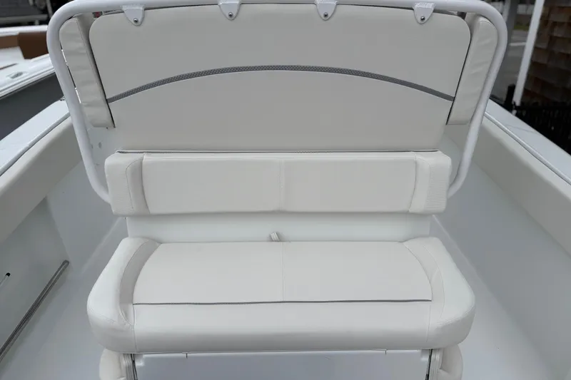 Slide: The Image of 2026 Sea Hunt Ultra 235 SE boat seat, white cushioned design, rear view. - 3
