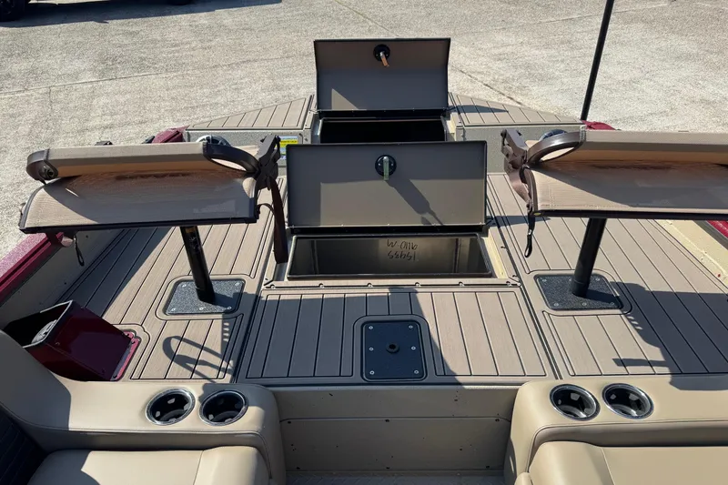 Slide: The Image of 2026 SeaArk Easy 200 boat deck with storage compartments and seating. - 12