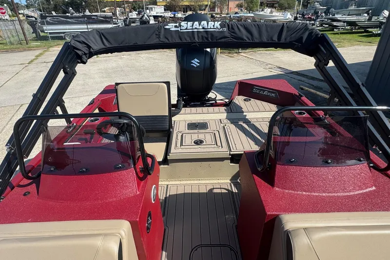Slide: The Image of 2026 SeaArk Easy 200 boat interior with red accents and Suzuki outboard motor. - 15