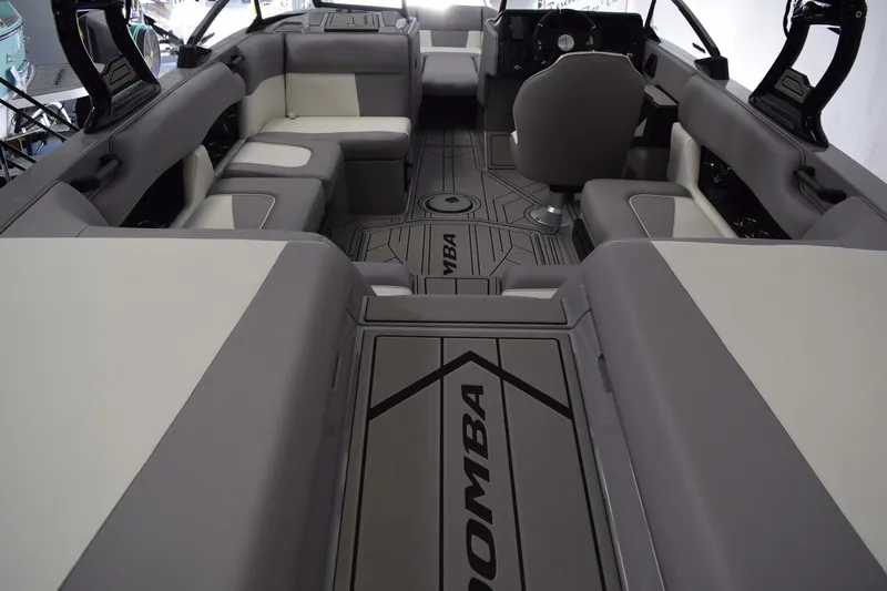 Slide: The Image of 2026 Moomba Craz boat interior with gray and white seating, modern design, and spacious layout. - 3