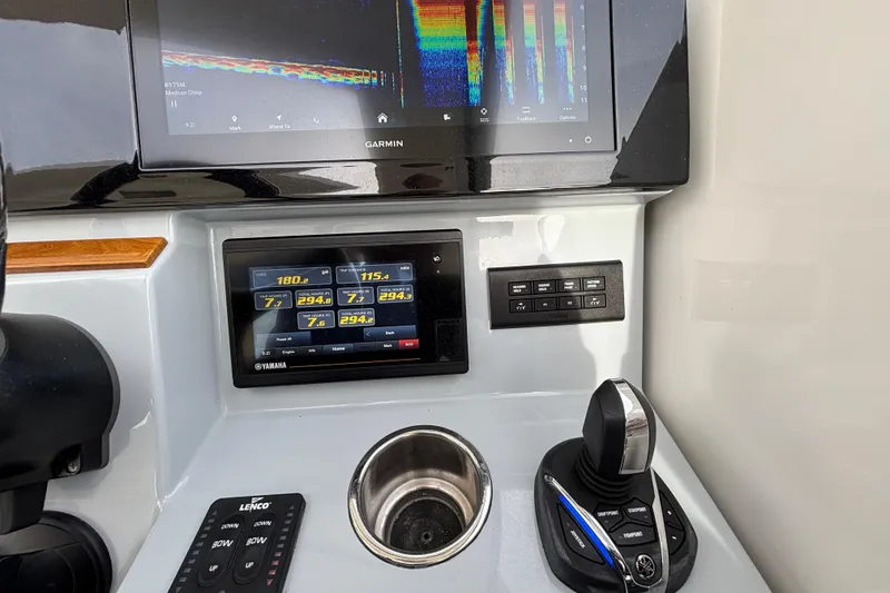 Slide: The Image of Control panel of 2022 Pursuit DC 365 Dual Console with Garmin and Yamaha displays. - 26