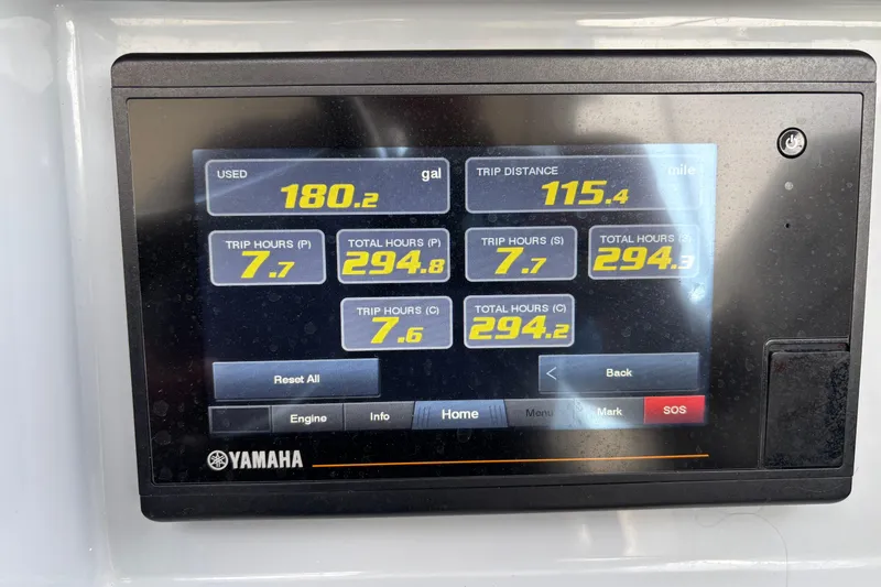 Slide: The Image of Yamaha display showing fuel usage and trip data on 2022 Pursuit DC 365 Dual Console. - 27