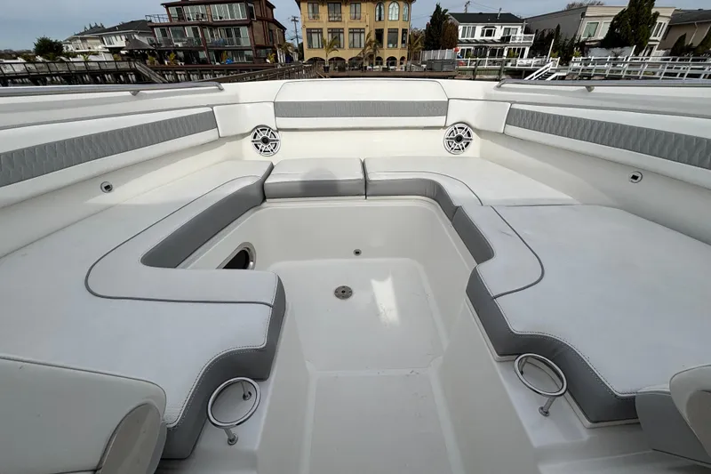 Slide: The Image of 2022 Pursuit DC 365 Dual Console boat interior with spacious seating and modern design. - 39