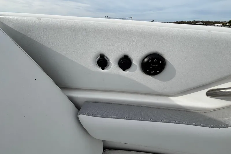 Slide: The Image of Interior view of 2022 Pursuit DC 365 Dual Console boat with control panel. - 41