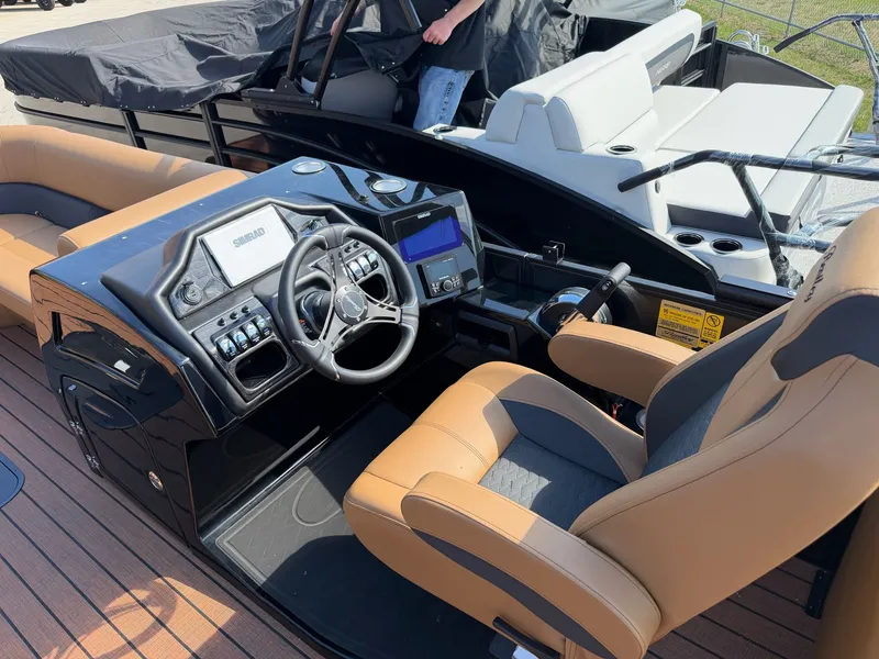 Slide: The Image of Interior of 2026 Bentley Pontoons ELITE 253 ADMIRAL with luxurious cockpit. - 10