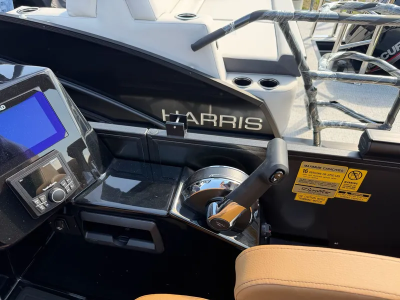 Slide: The Image of Interior view of Bentley Pontoons ELITE 253 ADMIRAL 2026 helm. - 12