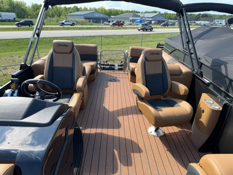 Slide: The Image of 2026 Bentley Pontoons ELITE 253 ADMIRAL interior view, luxurious seating and helm. - 7