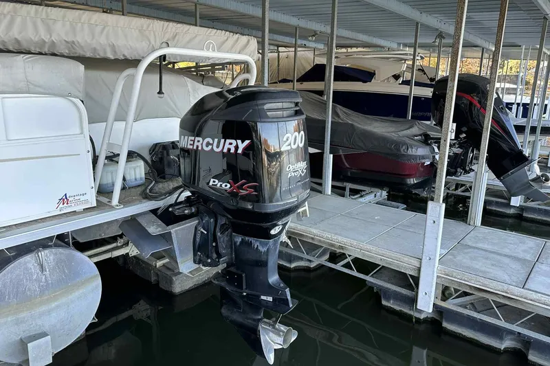 Slide: The Image of 2011 Bentley Pontoons 240/243 Cruise with Mercury 200 Pro XS engine at dock. - 10