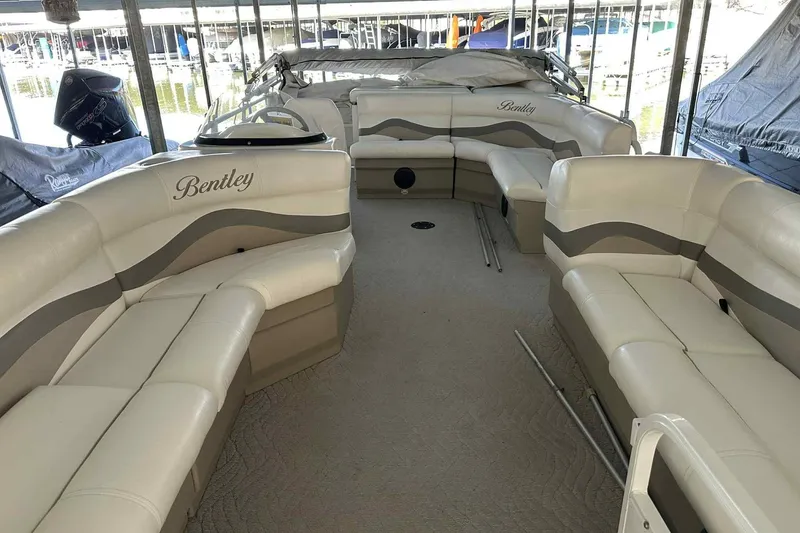 Slide: The Image of 2011 Bentley Pontoons 240/243 Cruise interior with luxurious seating and elegant design. - 11