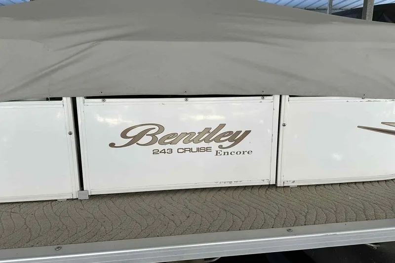 Slide: The Image of 2011 Bentley Pontoons 243 Cruise Encore with protective cover. - 6