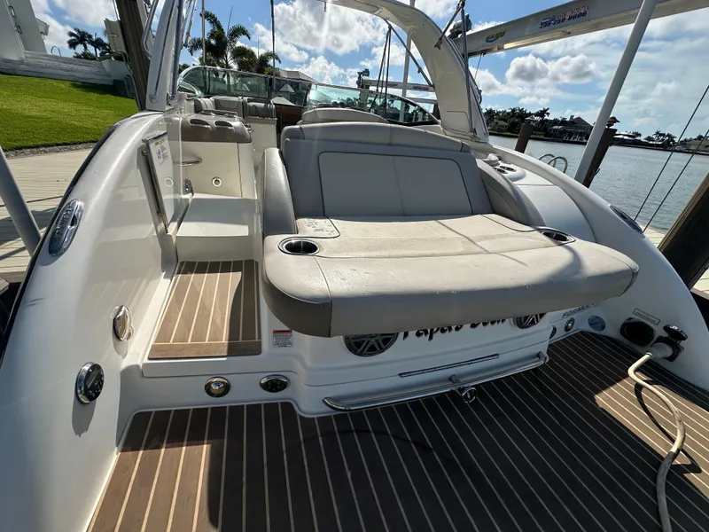 Slide: The Image of 2015 Formula 310 Bowrider boat with spacious seating and sleek design. - 2