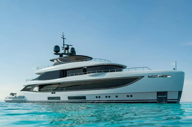 Slide: The Image of Luxurious 2028 Benetti Oasis 42M Co Ownership yacht on serene blue waters. - 2