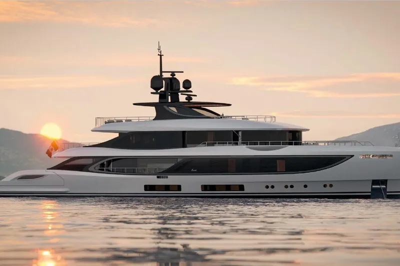 Slide: The Image of Luxury Benetti Oasis 42M yacht at sunset, 2028 model, on serene waters. - 5