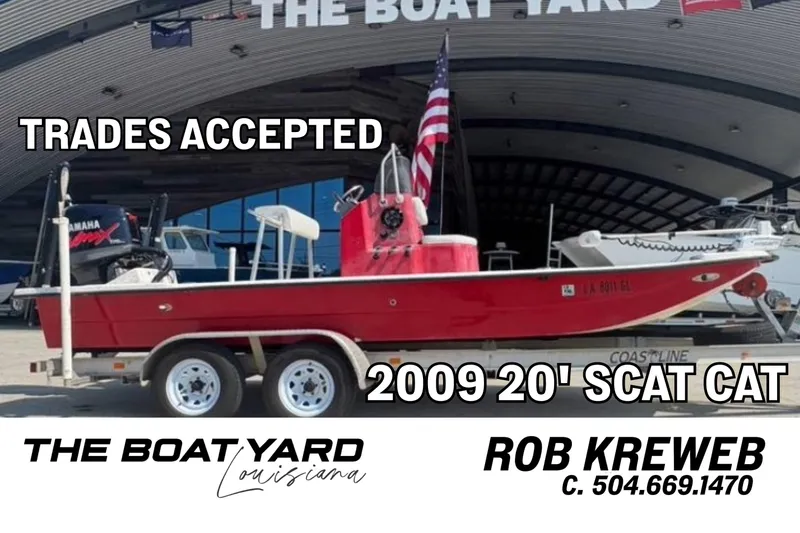 The Image of Red 2009 Bass Cat Scat Cat boat on trailer at The Boat Yard. - 0