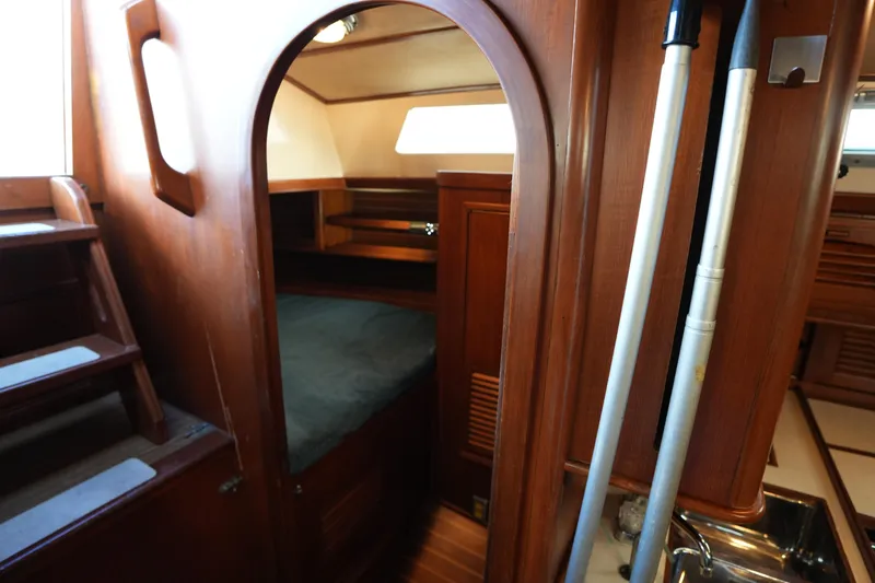 Slide: The Image of Interior of 1985 Ta Chiao 38 sailboat with wooden finish and cozy cabin. - 26