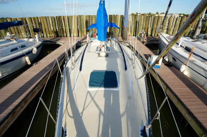 Slide: The Image of 1985 Ta Chiao 38 sailboat docked at marina, top view. - 6