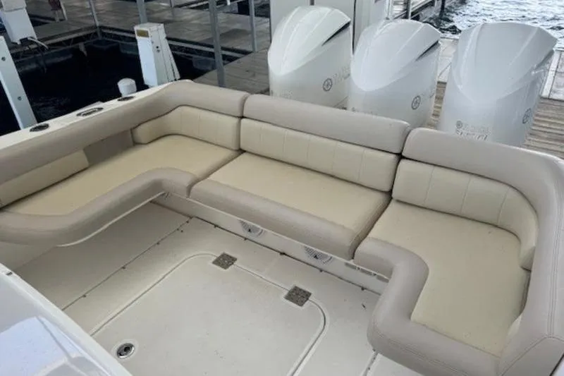 Slide: The Image of Luxurious seating area on a 2016 Everglades 360LXC boat with triple engines. - 11