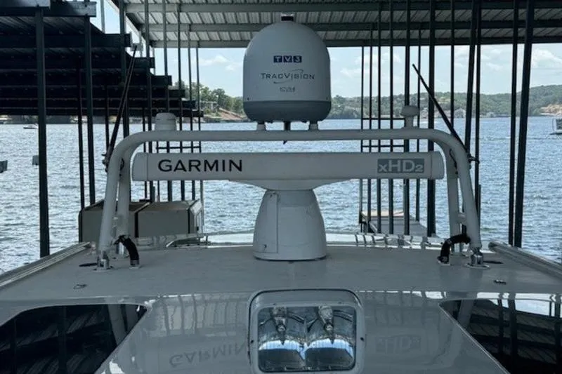 Slide: The Image of 2016 Everglades 360LXC boat with Garmin xHD2 radar and TracVision system. - 30
