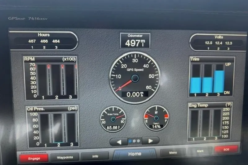 Slide: The Image of Dashboard display of a 2016 Everglades 360LXC boat showing odometer, RPM, and engine metrics. - 40