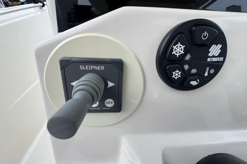 Slide: The Image of Control panel of 2022 Sailfish 320 CC boat featuring Sleipner and Ultraflex systems. - 14