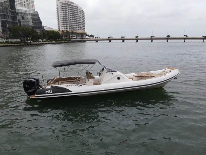 The Image of 2017 Nuova Jolly Princess boat on water, cityscape background, overcast sky. - 0