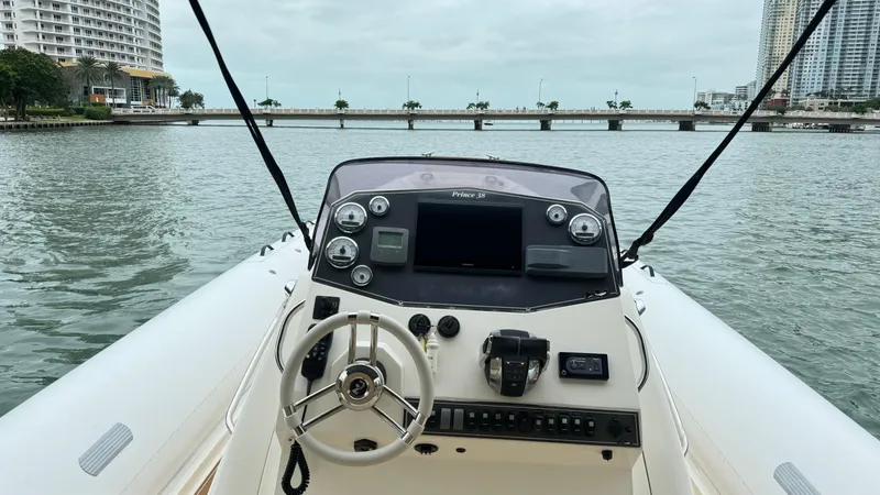 Slide: The Image of 2017 Nuova Jolly Princess boat dashboard with cityscape and water view. - 29