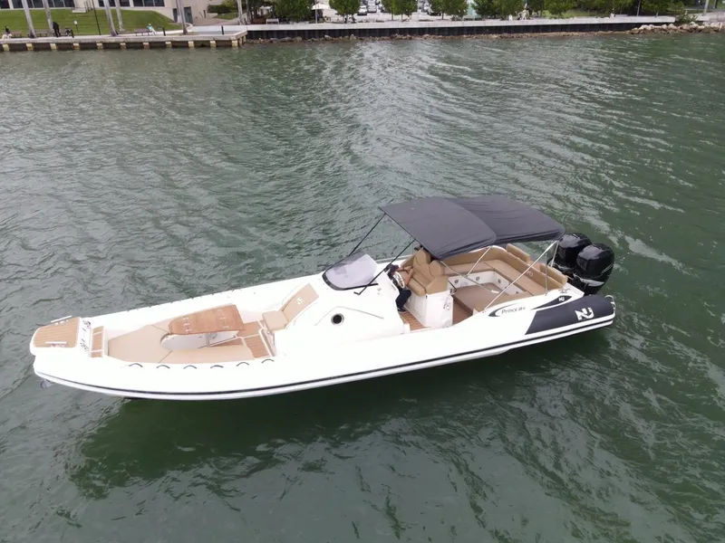 Slide: The Image of 2017 Nuova Jolly Princess boat on water, featuring sleek design and spacious seating. - 3