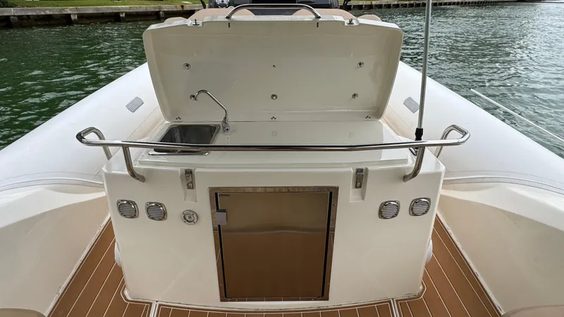 Slide: The Image of 2017 Nuova Jolly Princess boat with open storage compartment and sink on deck. - 36