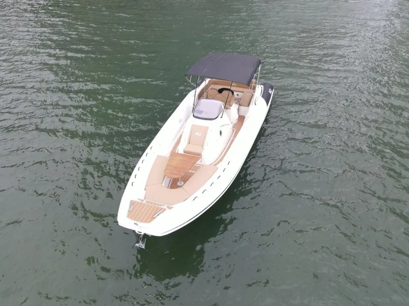 Slide: The Image of 2017 Nuova Jolly Princess boat with canopy on calm water. - 4