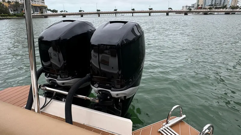 Slide: The Image of 2017 Nuova Jolly Princess boat with dual outboard motors on a calm waterway. - 47