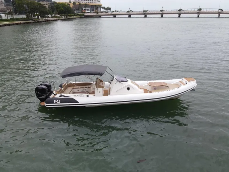Slide: The Image of 2017 Nuova Jolly Princess boat on calm water near a bridge. - 6