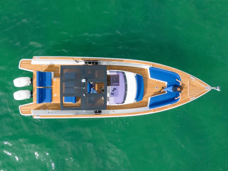 Slide: The Image of Overhead view of 2019 Fjord 38 yacht on clear green water. - 34