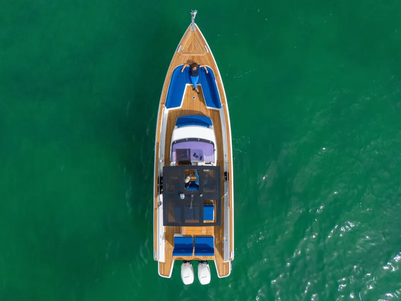 Slide: The Image of Overhead view of 2019 Fjord 38 boat on clear green water. - 35