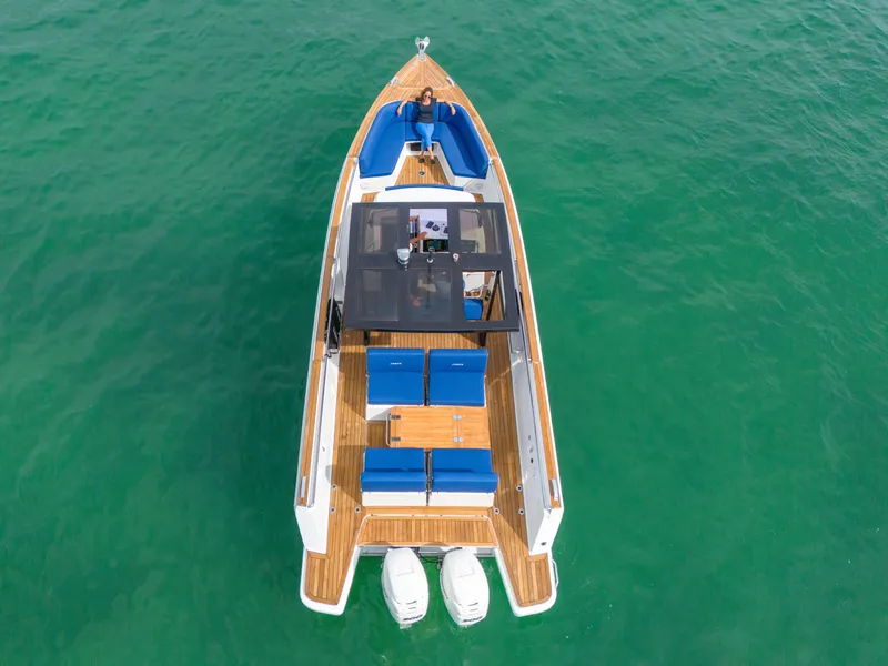 Slide: The Image of 2019 Fjord 38 boat on clear turquoise water, aerial view. - 36