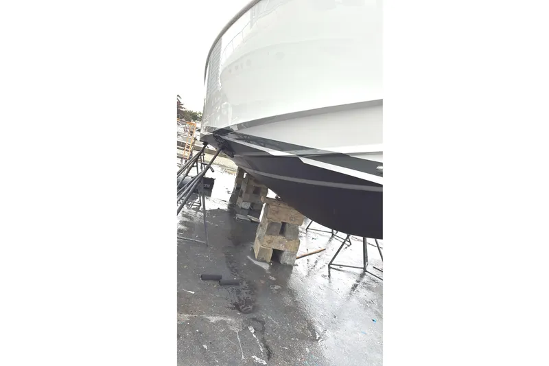 Slide: The Image of 2019 Fjord 38 boat on blocks, hull view in a shipyard. - 45