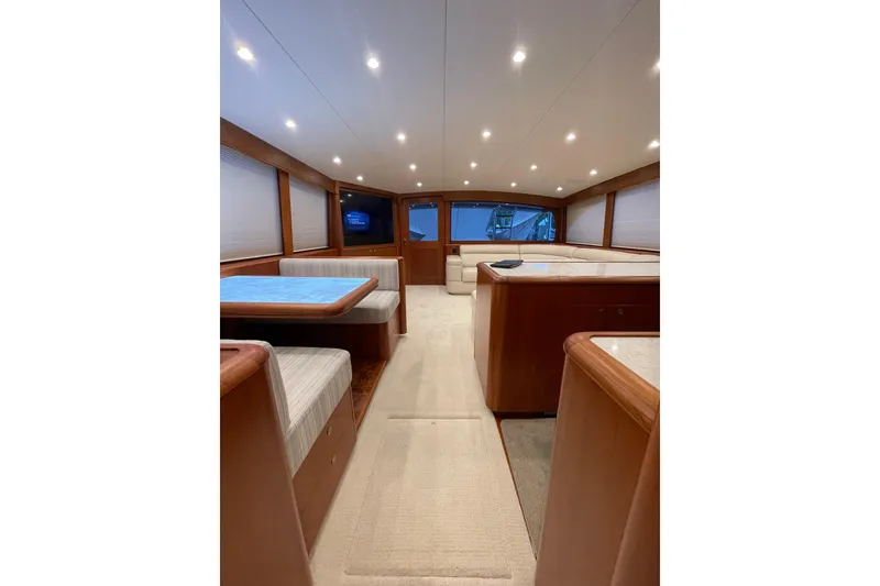 Slide: The Image of Luxurious interior of a 1999 Merritt Sportfish yacht with elegant wood finishes. - 2