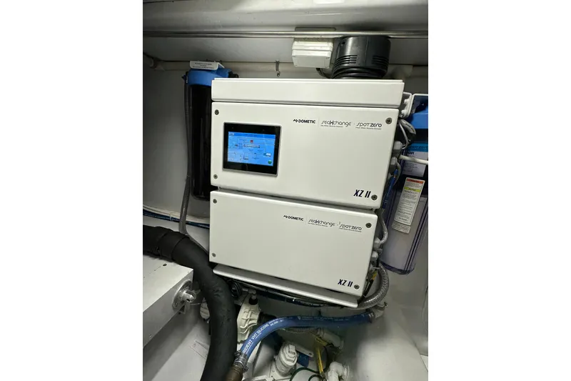 Slide: The Image of Dometic water filtration system in 1999 Merritt Sportfish boat engine room. - 22