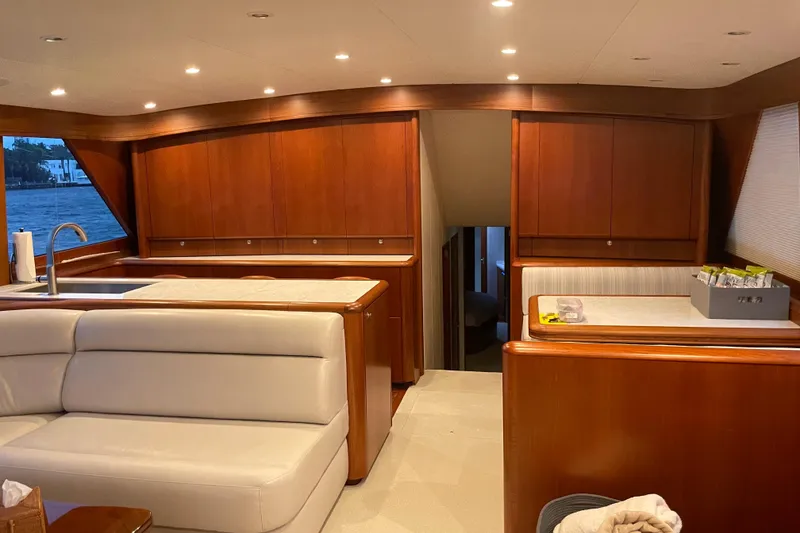 Slide: The Image of Luxurious interior of a 1999 Merritt Sportfish yacht with elegant wood finishes. - 3