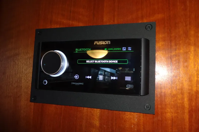Slide: The Image of Fusion Bluetooth audio system on 1977 Hatteras 53 Motor Yacht. - 100