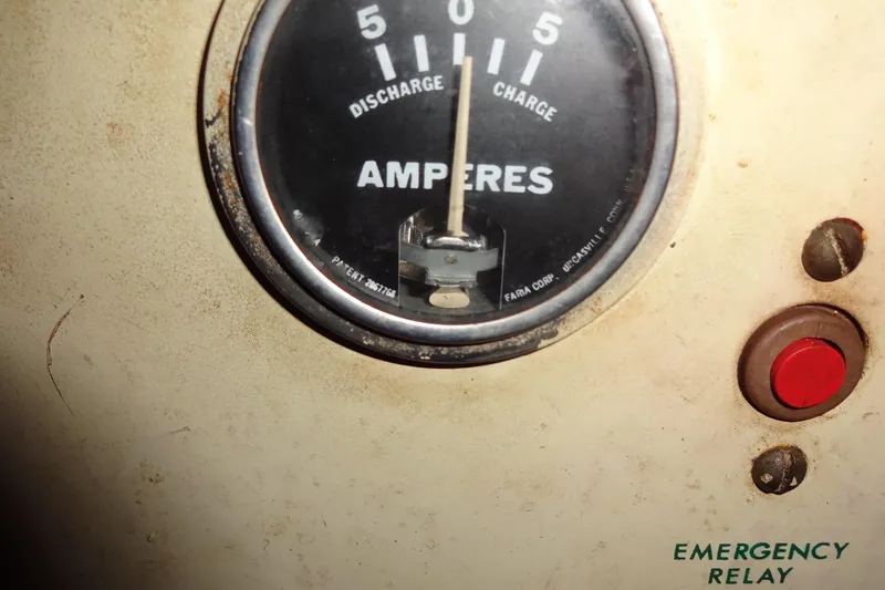 Slide: The Image of Ammeter gauge on 1977 Hatteras 53 Motor Yacht, showing charge and discharge levels. - 122